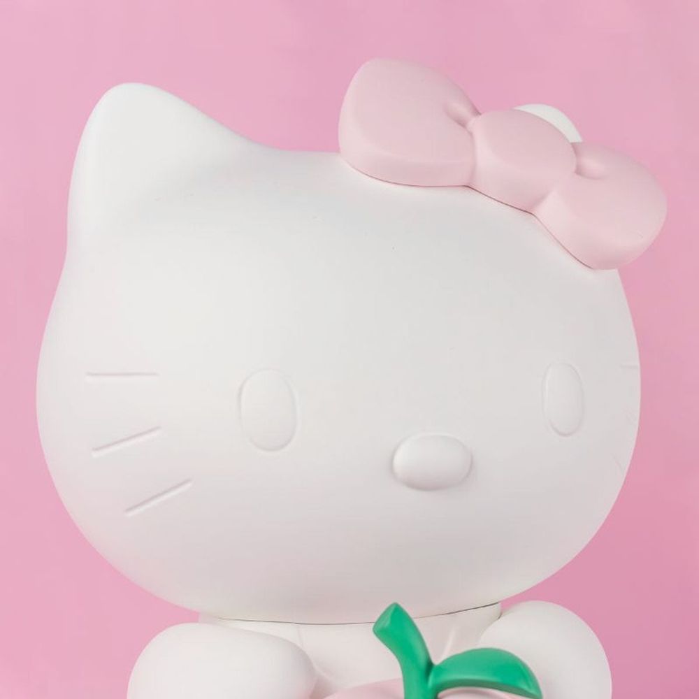 Hello Kitty Figure with Pastel Pink Apple – 10.2″ - FAO Schwarz